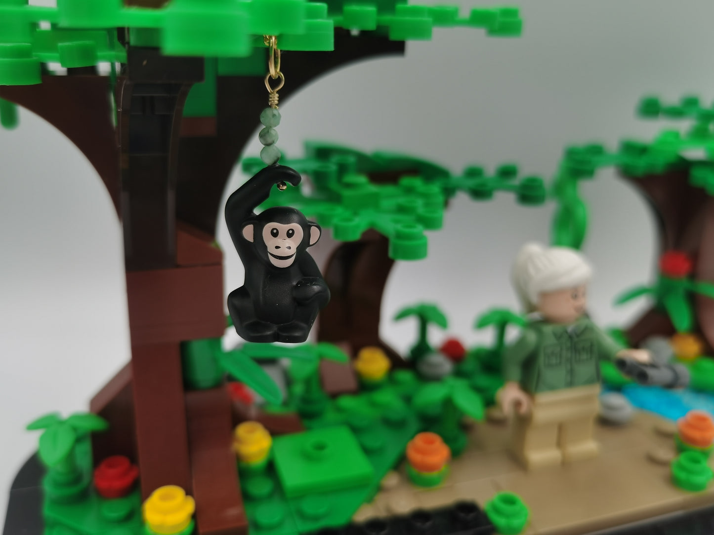 Lego Chimpanzee Infant Flint Necklace - In remembrance of Jane Goodall